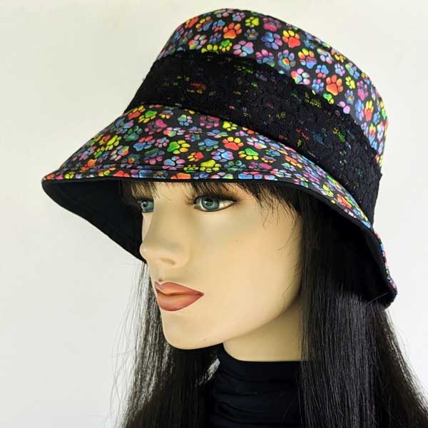 Summer Bucket Hat with lace trim, rainbow paws on black, fully lined