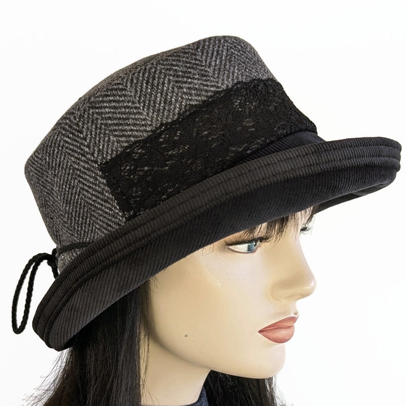 Cord Fashion hat with in black and grey, herringbone print, with large bucket brim and adjustable fit