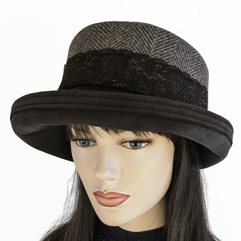 Cord Fashion hat with in black and grey, herringbone print, with large bucket brim and adjustable fit