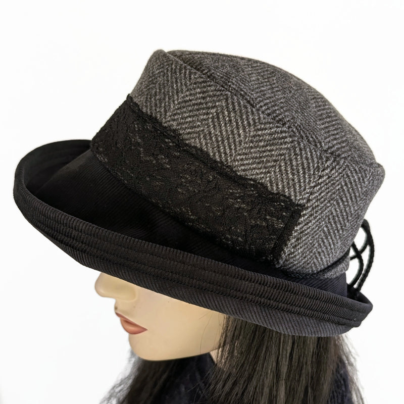 Cord Fashion hat with in black and grey, herringbone print, with large bucket brim and adjustable fit