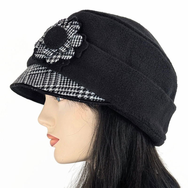 Fleece Fashion Cap with floral pin in black fleece with woolen plaid trim