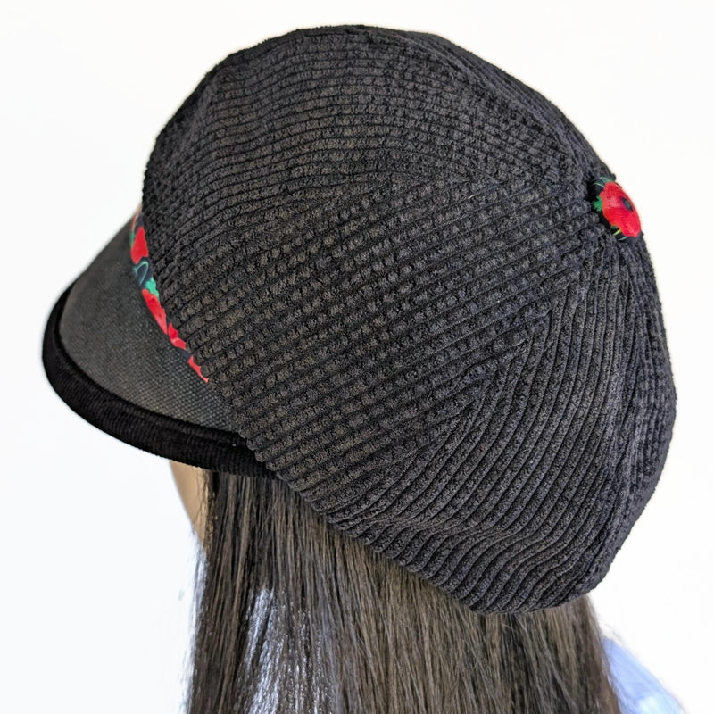 Baggy Poorboy Newsboy Fashion Cap in black cord, poppy print band with wide flattering visor, one size fit