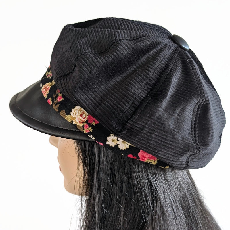 Poorboy Fashion Cap in black corduroy with black faux leather visor and red rose cord band
