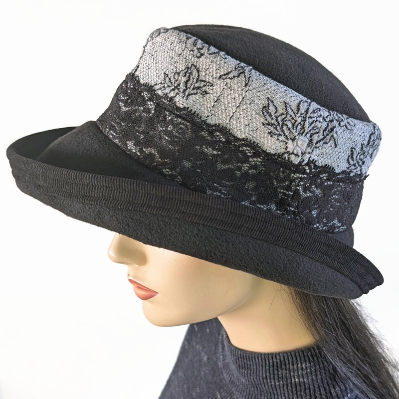 Winter Fashion hat with large bucket brim, charcoal and black floral with lace trim