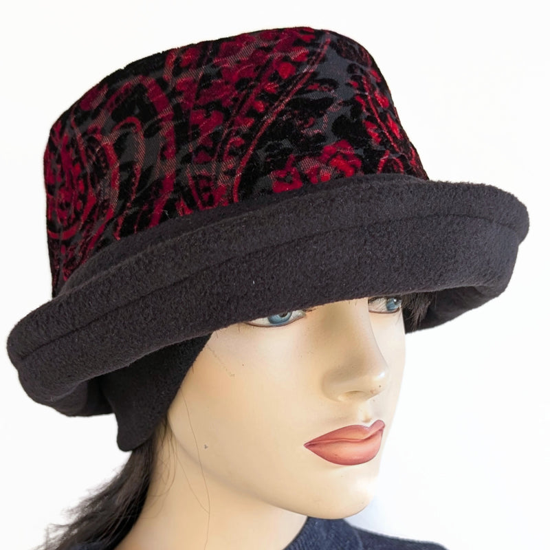 Niagara Fashion Bucket Hat with earflaps,  in black fleece with red and  black abstract band and flattering brim