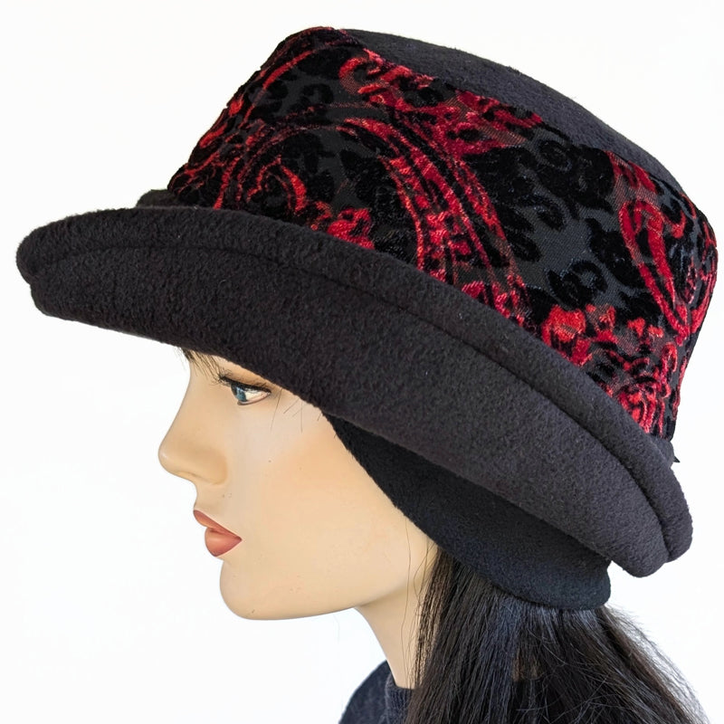 Niagara Fashion Bucket Hat with earflaps,  in black fleece with red and  black abstract band and flattering brim