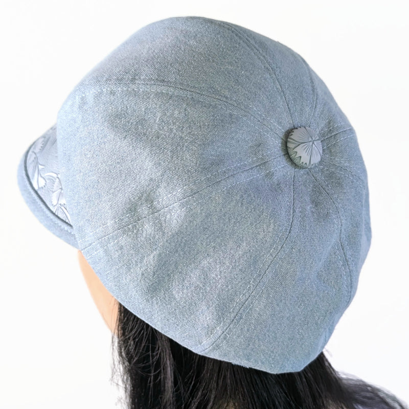 Baggy Poorboy Fashion Cap in bleached denim, embossed vinyl visor, button trim
