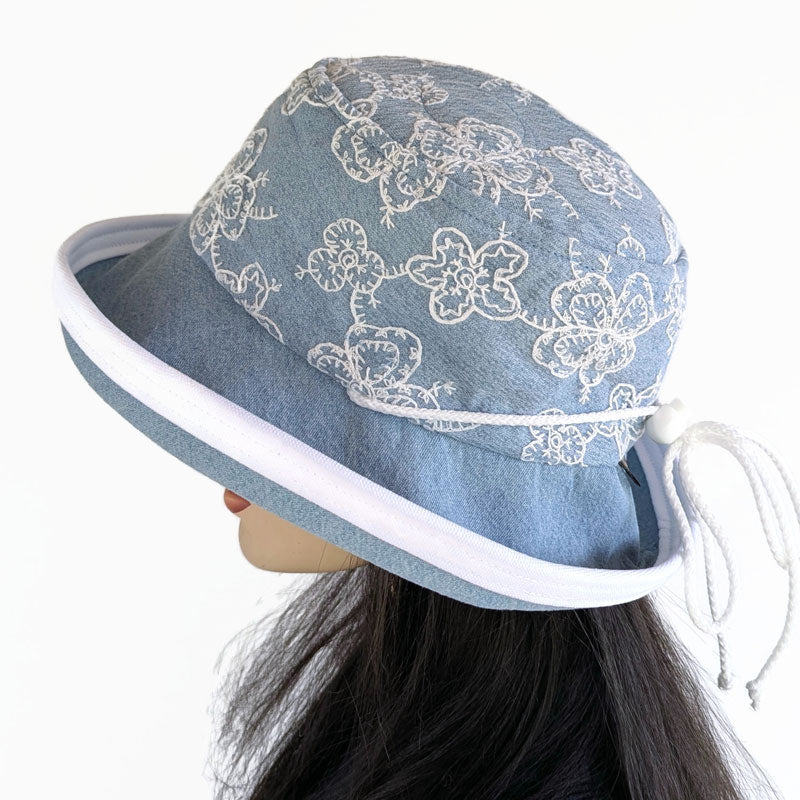 Fashion Sunblocker with wide brim and adjustable fit, bleached denim with lace overlay, adjustable fit