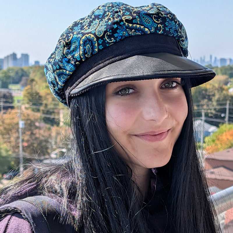 Poorboy Fashion Cap with black vegan leather trim, blue and yellow paisley, relaxed fit