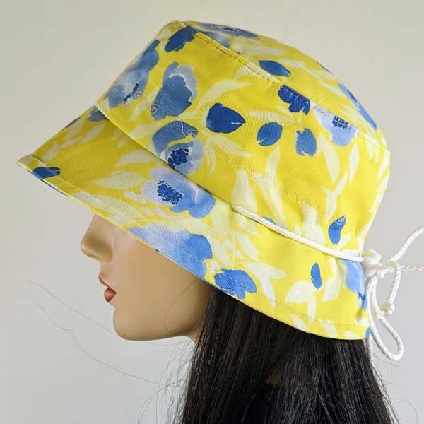 Summer Bucket Hat, yellow and blue floral theme, adjustable fit, fully lined