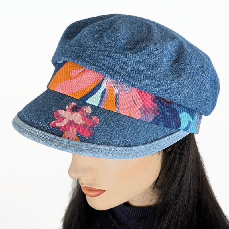 Fisher Fashion Cap in washed blue denim, floral accents, wide visor, relaxed fit