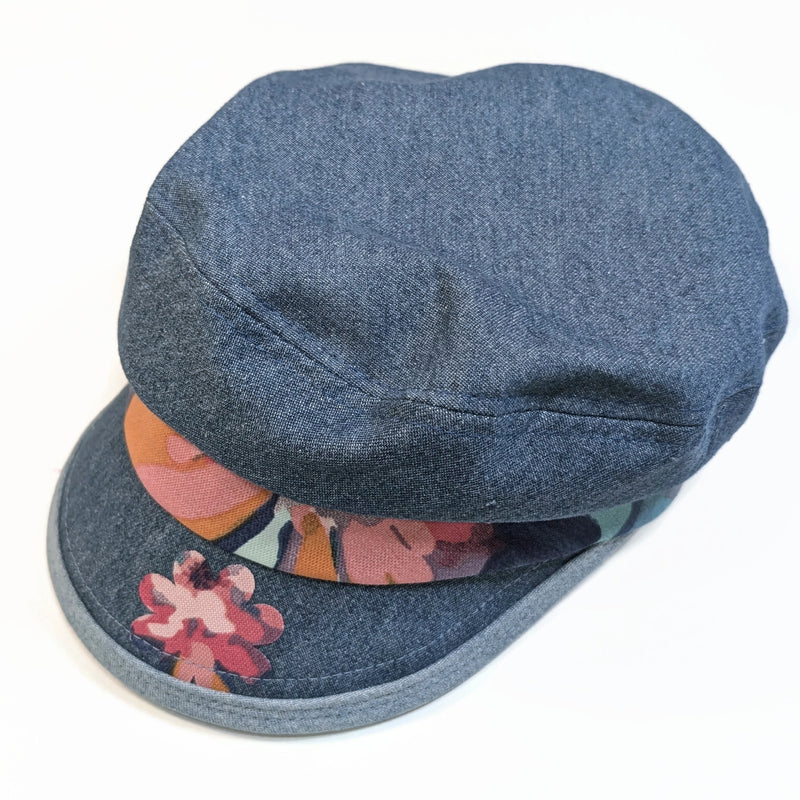 Fisher Fashion Cap in washed blue denim, floral accents, wide visor, relaxed fit