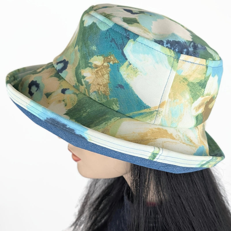 The Perfect Hat UV summer sun hat built to resist sun, rain and stains, blues abstract floral