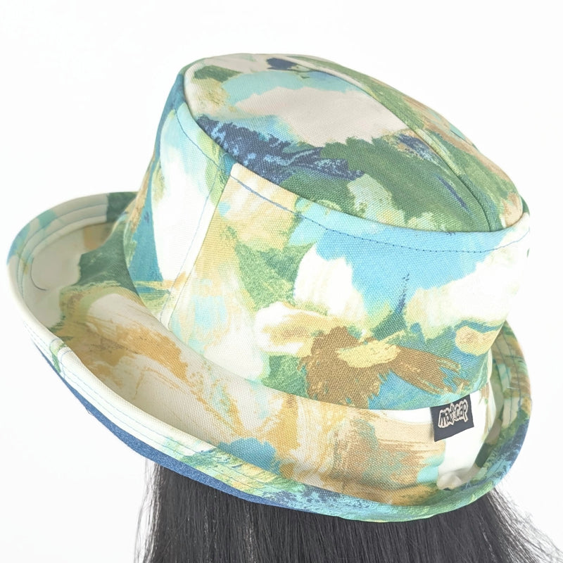 The Perfect Hat UV summer sun hat built to resist sun, rain and stains, blues abstract floral
