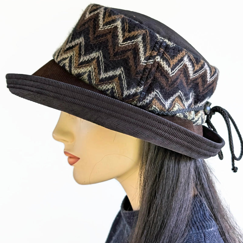 Cord Fashion hat with in black and browns, woolen zig zag band, with large bucket brim and adjustable fit