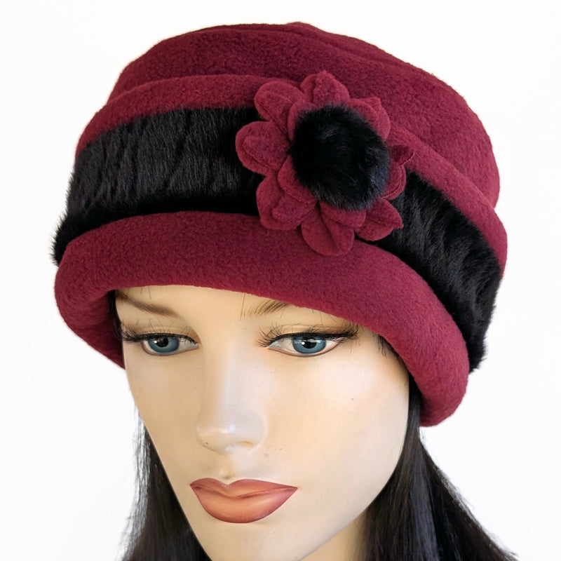 Fleece Fashion Toque with adjustable cuff and faux fur trim, with floral pin trim, asst'd colors