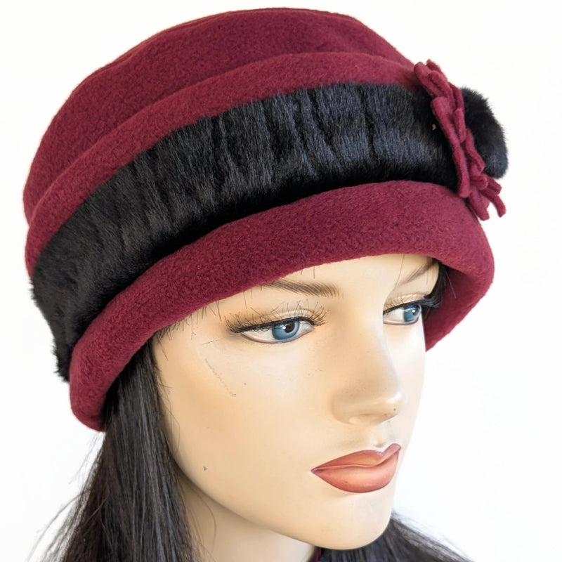 Fleece Fashion Toque with adjustable cuff and faux fur trim, with floral pin trim, asst'd colors