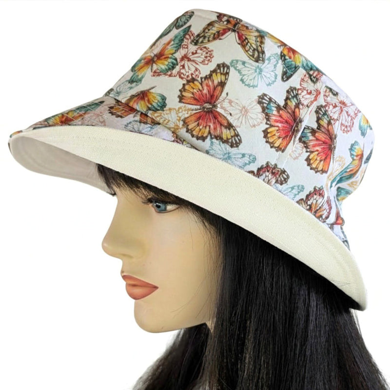 Sun Hat Perfect Bucket Hat, orange based butterfly print, deep bucket brim