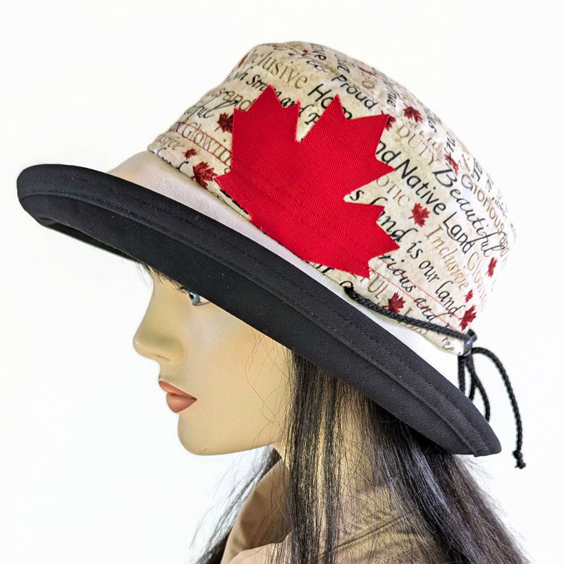 101 Sunblocker UV summer sun hat with large wide brim featuring Canada patriotic words maple leaves