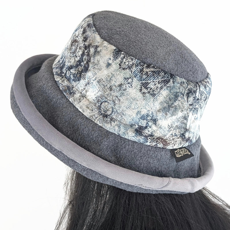 Premium Winter Fashion Hat with earflaps, in charcoal with gorgeous grey themed abstract band, wide brim and tuck up earflaps