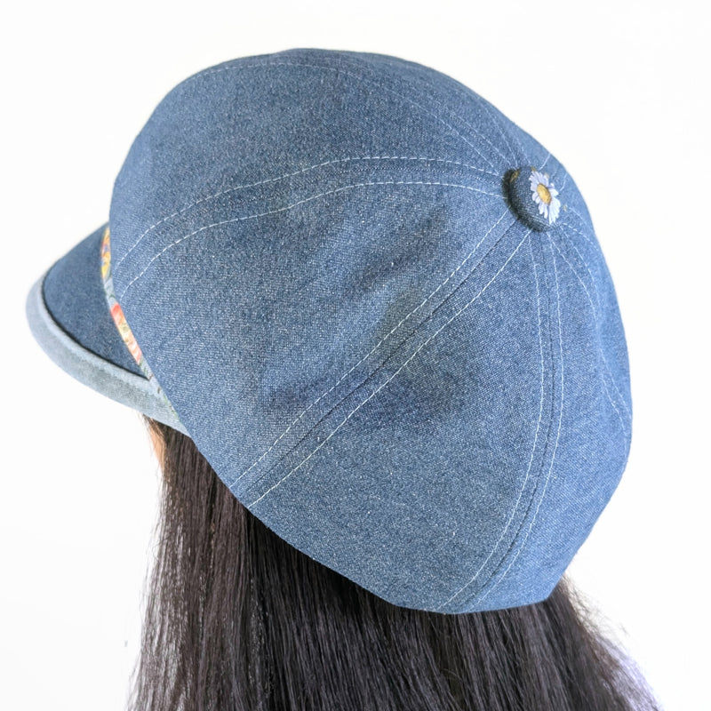 Poorboy Fashion Cap in washed blue denim, floral with dragonflies accents, flattering visor, baggy fit