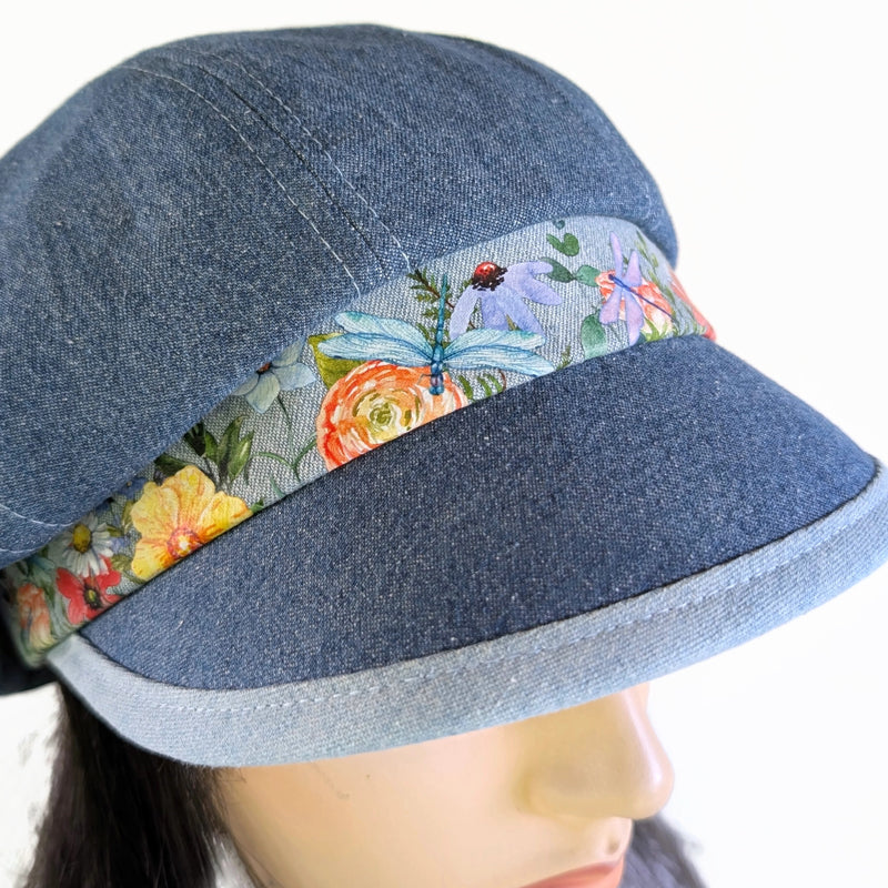 Poorboy Fashion Cap in washed blue denim, floral with dragonflies accents, flattering visor, baggy fit