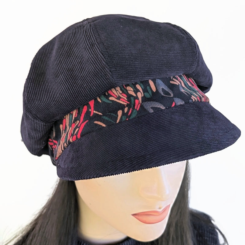 New Boho Fashion Cap in dark navy with navy fun peacock print inspired band, relaxed fit in corduroy