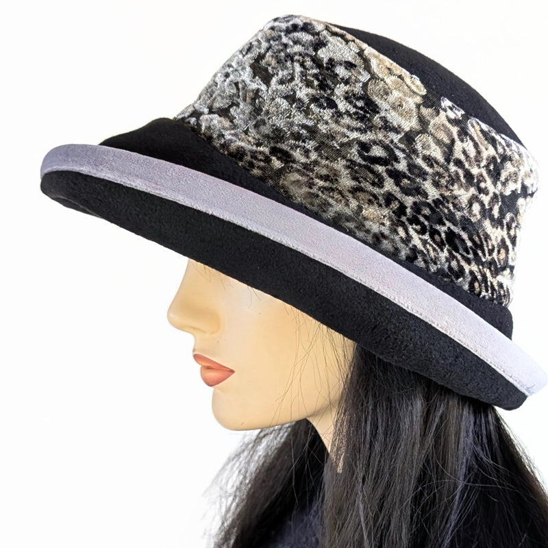 Premium Winter Fashion Hat with earflaps, in black with gorgeous silver and black animal print velvet band, silver velvet trim and wide brim