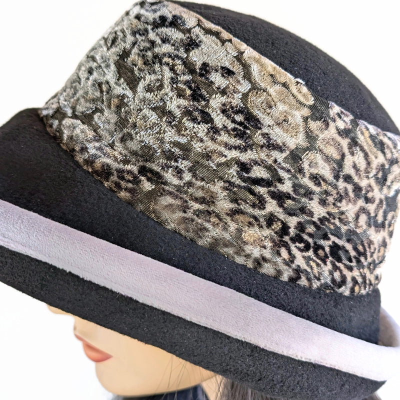 Premium Winter Fashion Hat with earflaps, in black with gorgeous silver and black animal print velvet band, silver velvet trim and wide brim