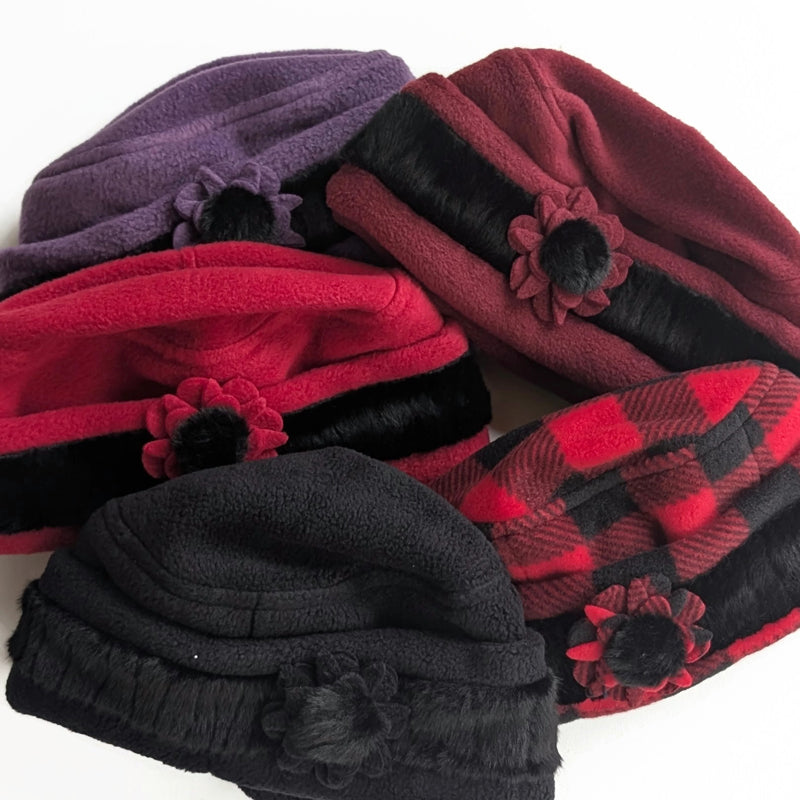 Fleece Fashion Toque with adjustable cuff and faux fur trim, with floral pin trim, asst'd colors