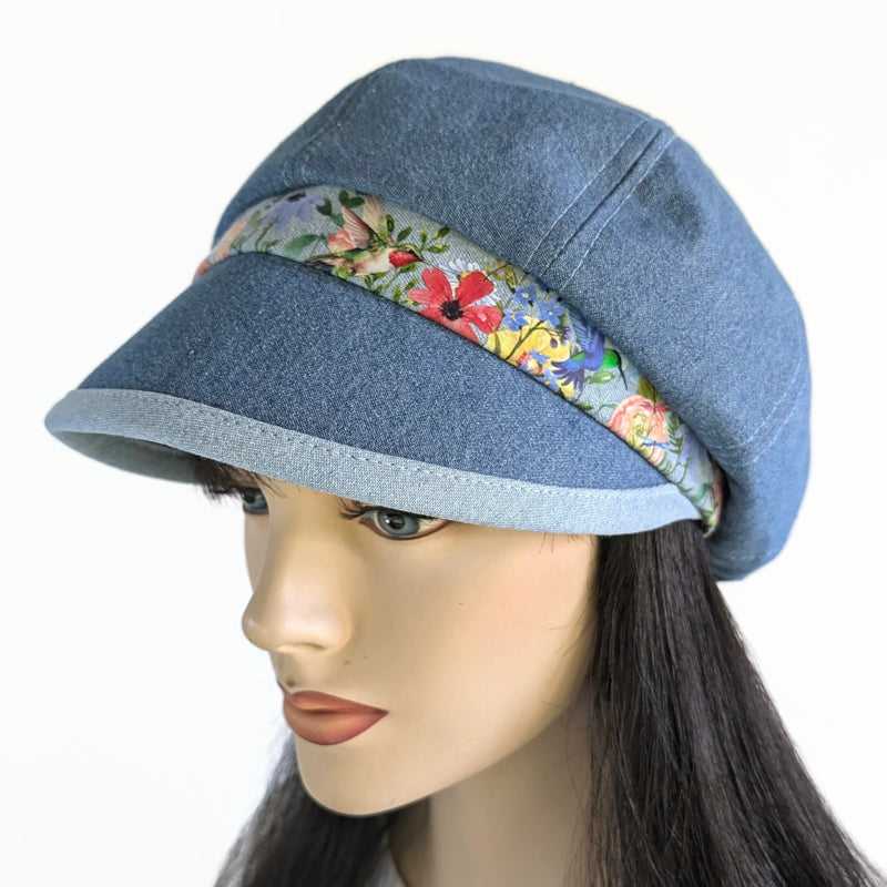 Poorboy Fashion Cap in washed blue denim, floral with hummingbird accents, flattering visor, baggy fit