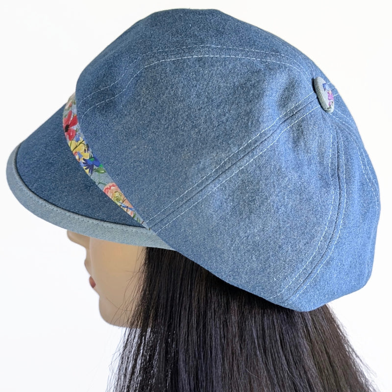 Poorboy Fashion Cap in washed blue denim, floral with hummingbird accents, flattering visor, baggy fit