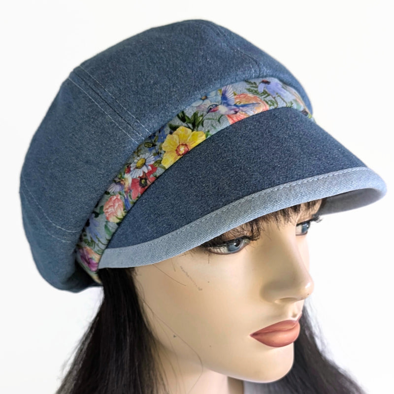 Poorboy Fashion Cap in washed blue denim, floral with hummingbird accents, flattering visor, baggy fit