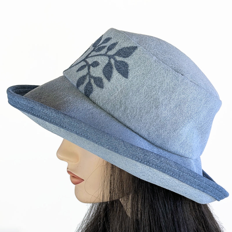 Denim Fashion hat in bleached denim with wide brim and adjustable fit, with leaf applique