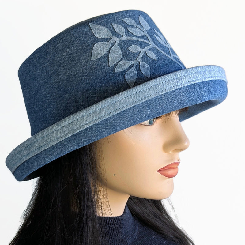 Denim Fashion hat with in royal washed denim with wide brim and adjustable fit, with leaf applique