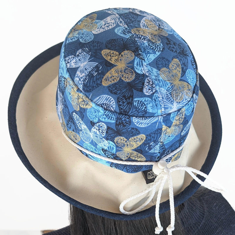Sunblocker UV summer hat sun hat with wide brim, navy with gold butterflies, adjustable fit