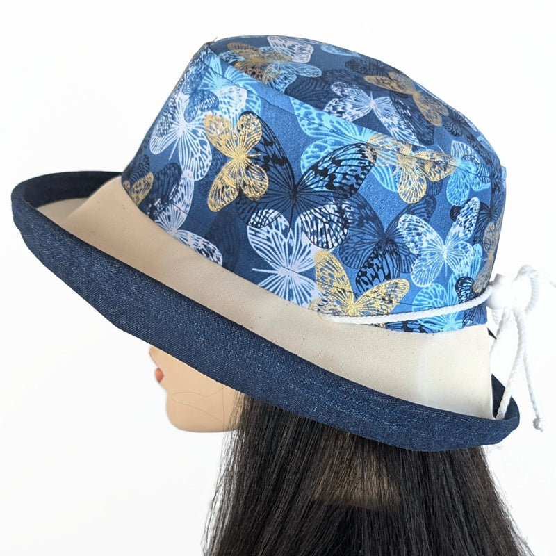Sunblocker UV summer hat sun hat with wide brim, navy with gold butterflies, adjustable fit