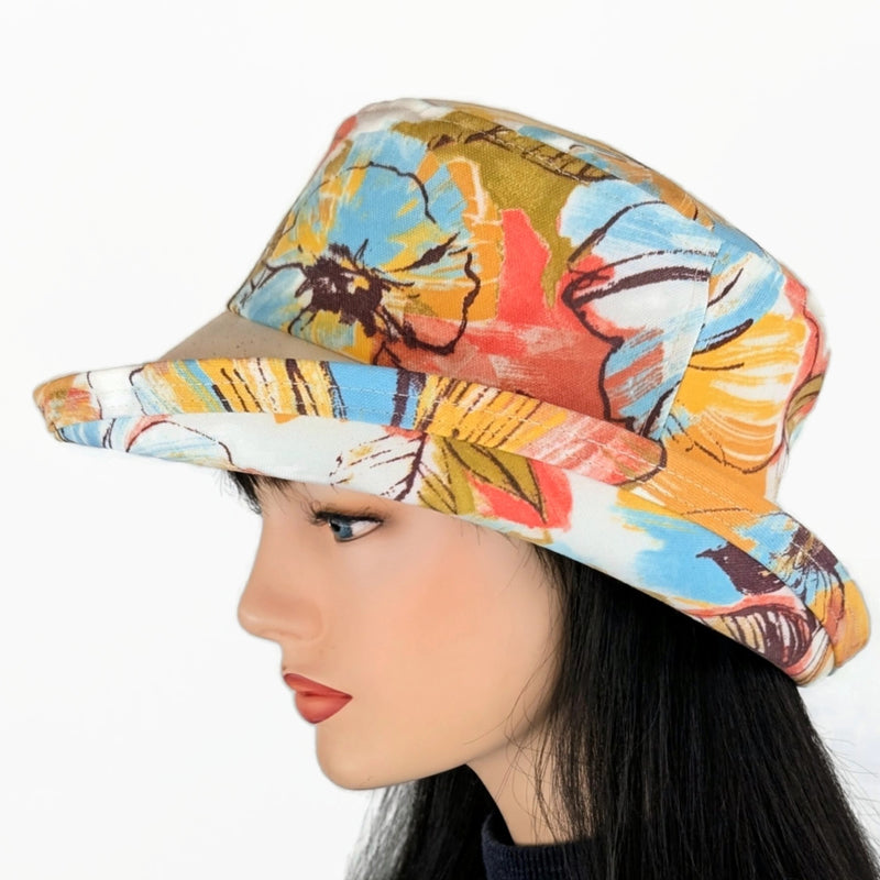 Weatherblocker rain/sun  fun hat built to resist sun, rain and stains, orange and earth tone floral