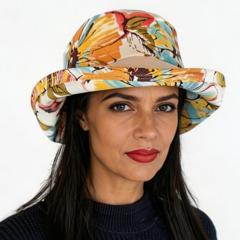 Weatherblocker rain/sun  fun hat built to resist sun, rain and stains, orange and earth tone floral