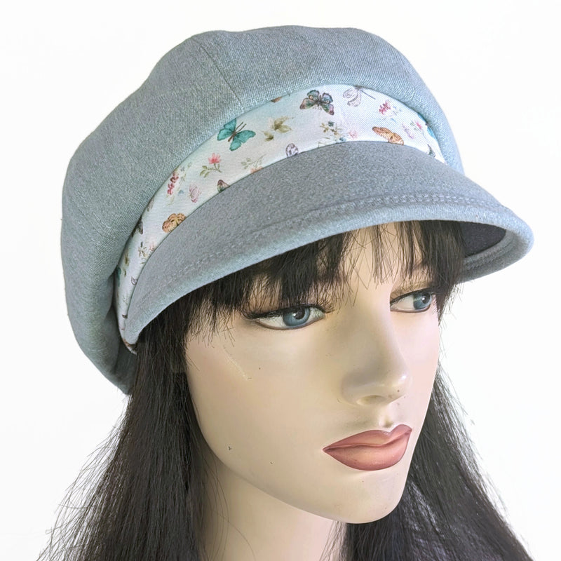 Poorboy Fashion Cap in bleached blue denim, pale butterfly dragonfly accents, flattering visor, baggy fit
