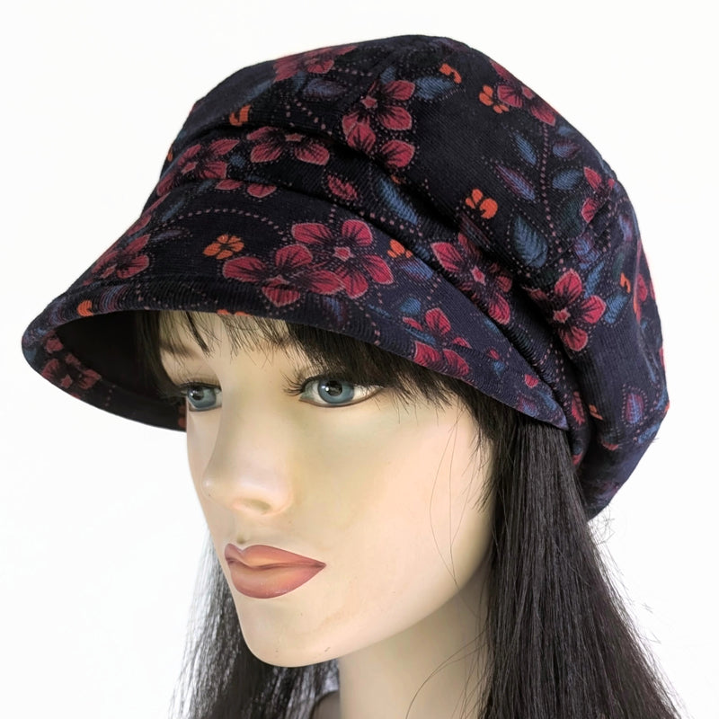 Baggy Poorboy Fashion Cap in  cord, plum based floral, with wide flattering visor, one size fit