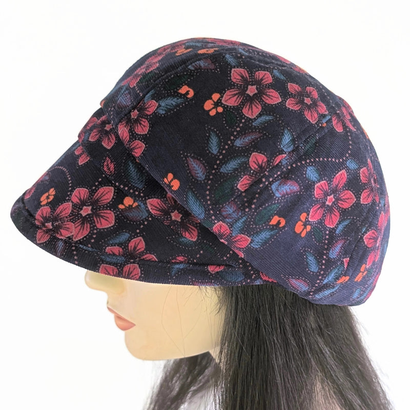 Baggy Poorboy Fashion Cap in  cord, plum based floral, with wide flattering visor, one size fit