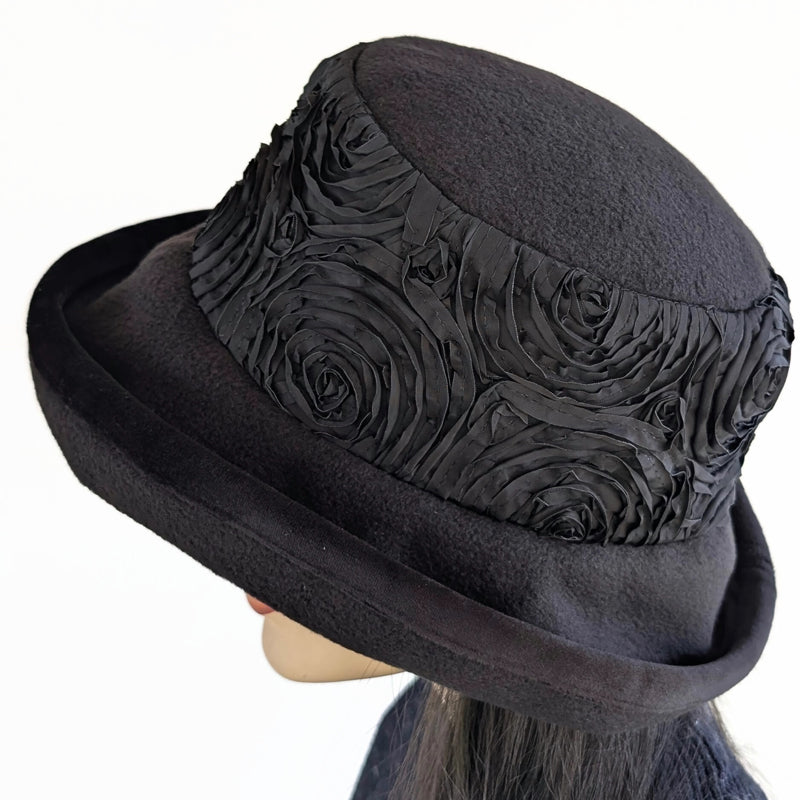 Premium Winter Fashion Hat in black with black ribbon rose band, black velvet edge trim and wide brim
