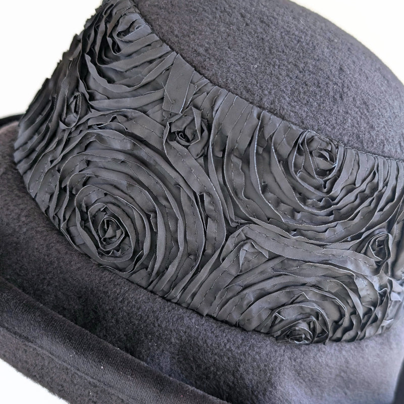 Premium Winter Fashion Hat in black with black ribbon rose band, black velvet edge trim and wide brim