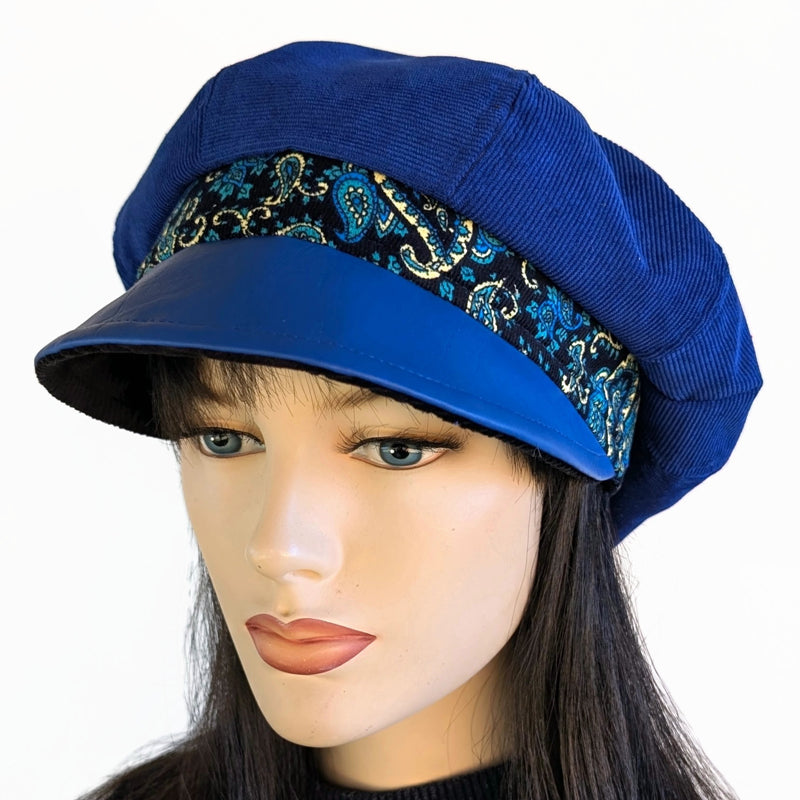 Poorboy Fashion Cap in royal blue corduroy with royal faux leather visor and paisley print trim