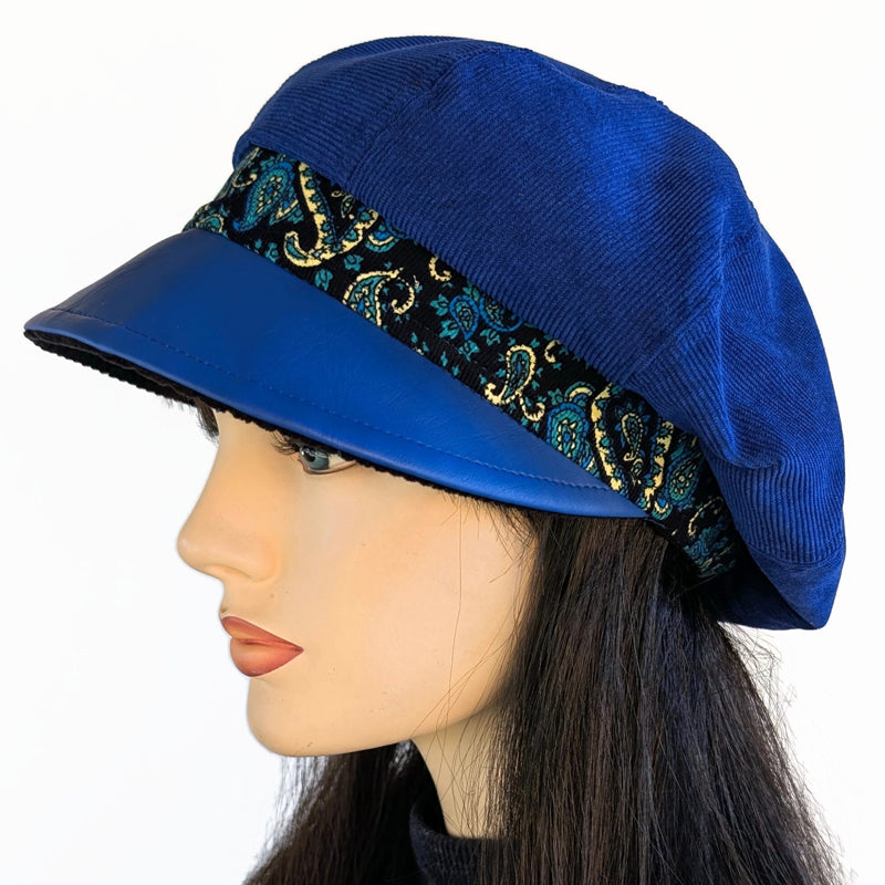 Poorboy Fashion Cap in royal blue corduroy with royal faux leather visor and paisley print trim