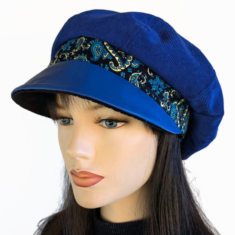 Poorboy Fashion Cap in royal blue corduroy with royal faux leather visor and paisley print trim