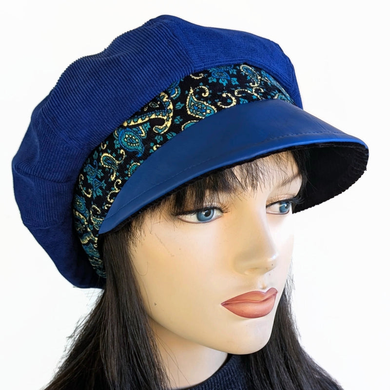 Poorboy Fashion Cap in royal blue corduroy with royal faux leather visor and paisley print trim