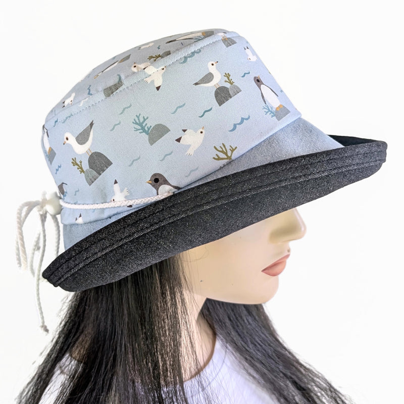 Sunblocker UV summer hat sun hat with wide brim, bleached denim water bird print, adjustable fit