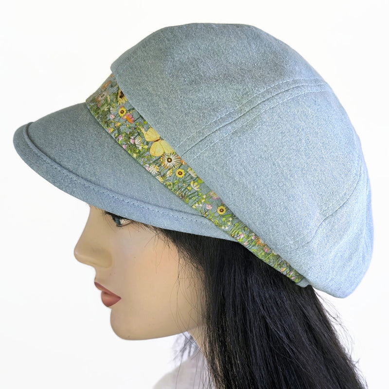 Poorboy Fashion Cap in bleached blue denim, yellow sunflower butterfly accents, flattering visor, baggy fit